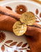 Rond de serviette de table Floria en métal doré en forme de feuille
