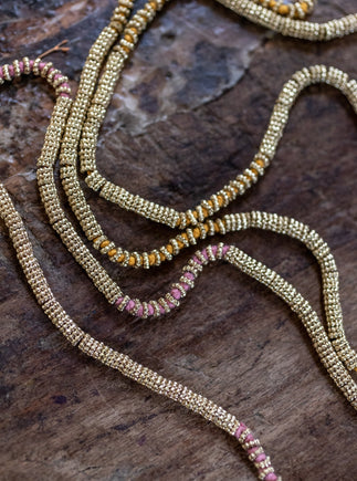 Sautoir perle or et coton