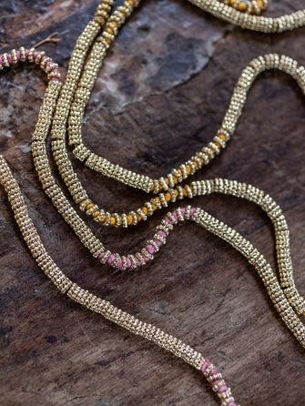 Sautoir perle or et coton