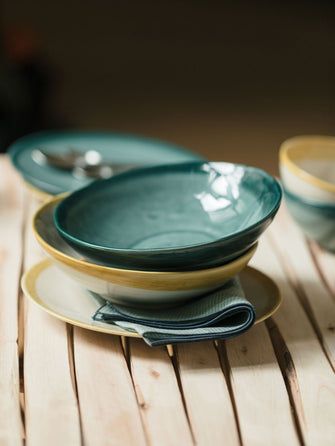 Lot de 4 coupelles en faïence émaillée