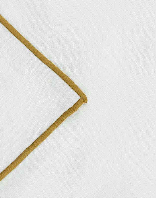 Détail du bourdon couleur Havane du rideau Epoca en lin