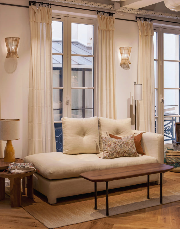 Deux appliques murales en rotin couleur naturelle pour salon