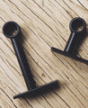 Accessoires noir en acier pour poser votre tringle à rideaux