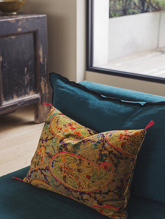 Housse de coussin Inika et pompons