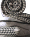 Housse de coussin Khadi à fond blanc et contours noirs 
