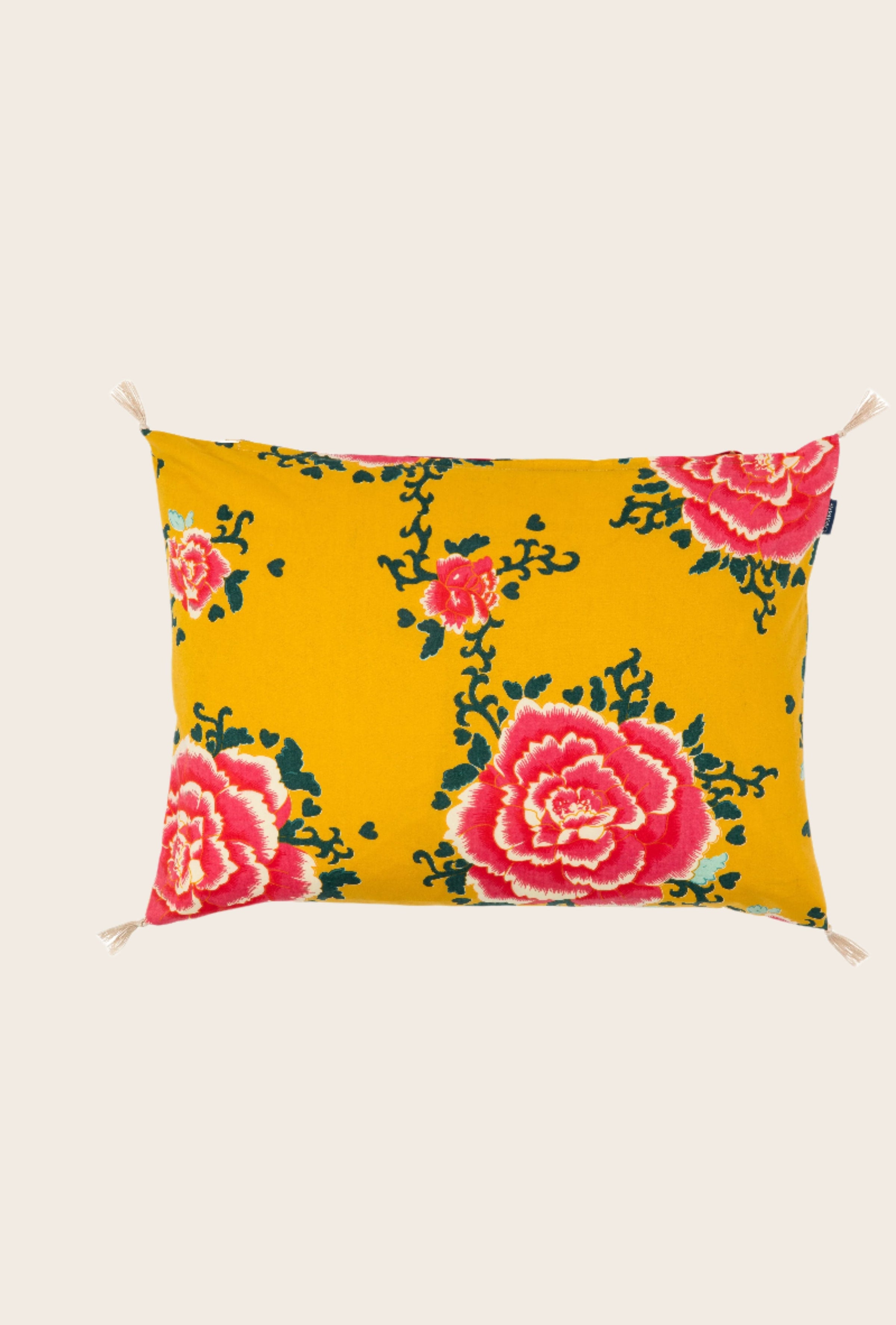 Housse de coussin aux motifs floraux jaune curcuma