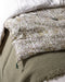 Courtepointe Letho en coton et microfibre avec pompons aux coins