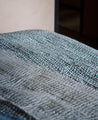 Linge de lit avec des imprimés végétaux
