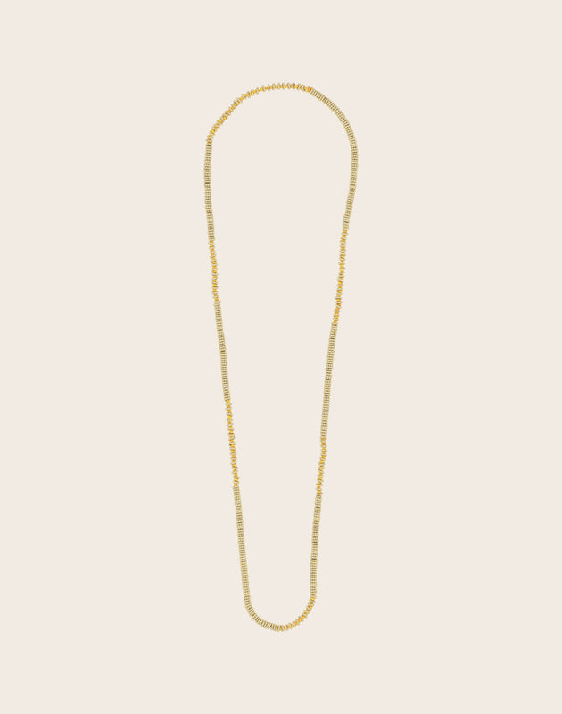 Sautoir perle or et coton