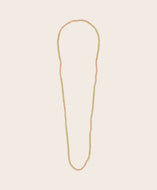 Sautoir perle or et coton