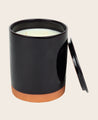 Bougie parfumée en cire végétale et minérale dans son pot en terracotta