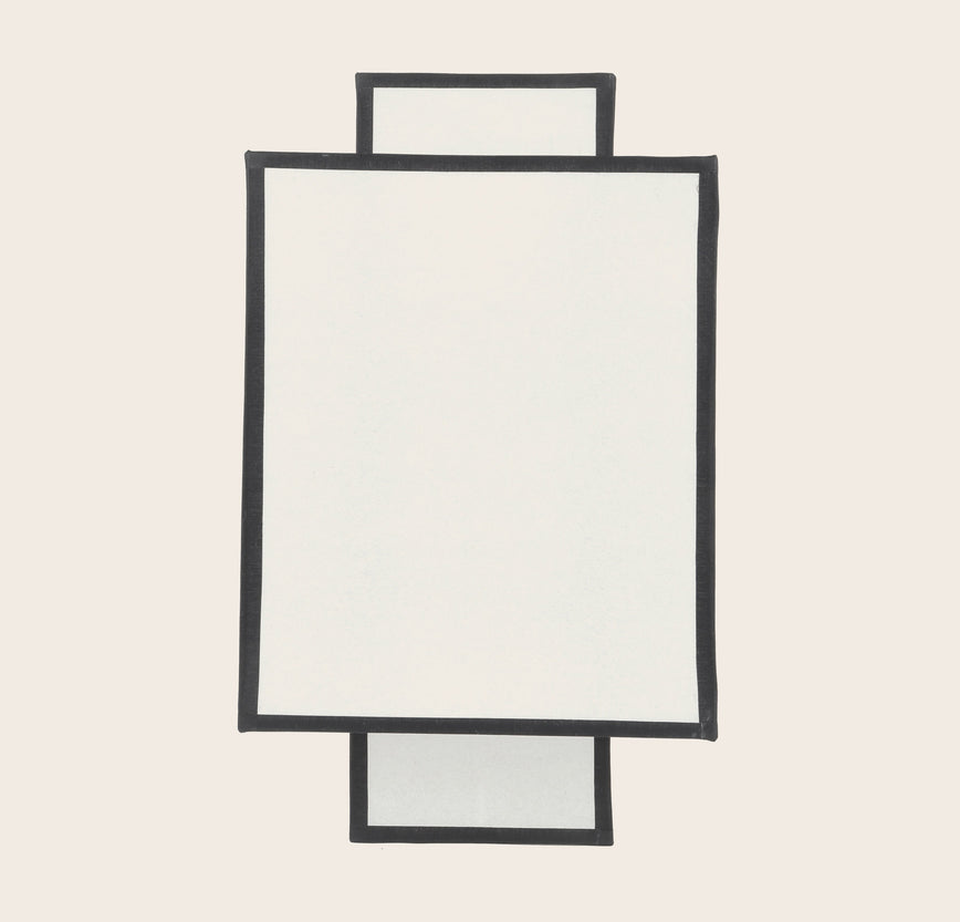 Applique murale en papier blanc avec des contours noirs