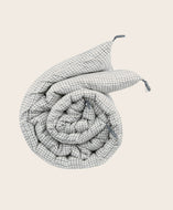 courtepointe à carreaux pour bout de lit à pompons