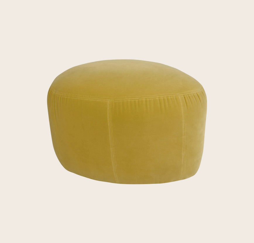 Petit pouf rond en tissu pour un salon Caillou