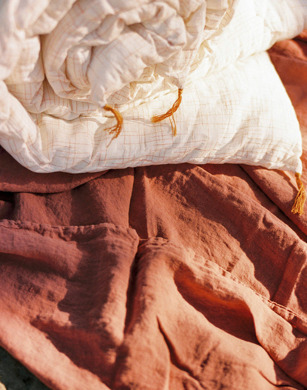 Matelas pour bout de lit à carreaux orange