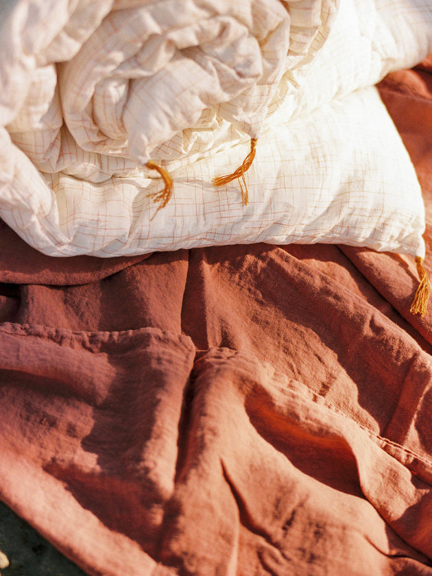 Matelas pour bout de lit à carreaux orange