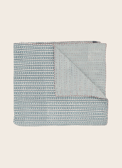 Linge de lit avec des imprimés végétaux